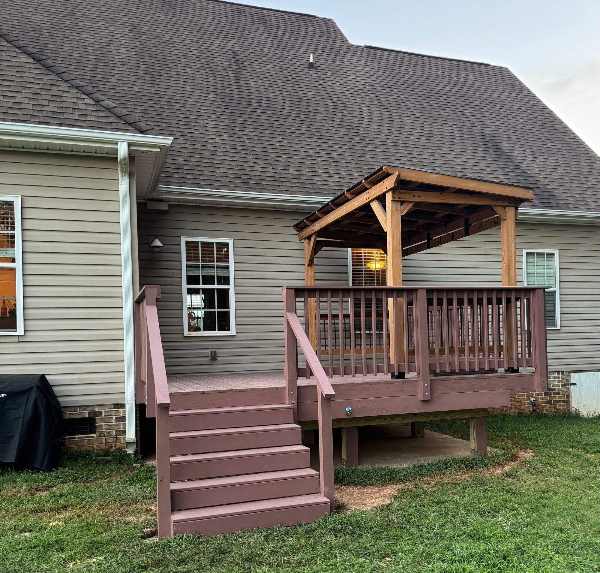 Back of a Carolinas home with a covered porch built by Berg Custom Builds