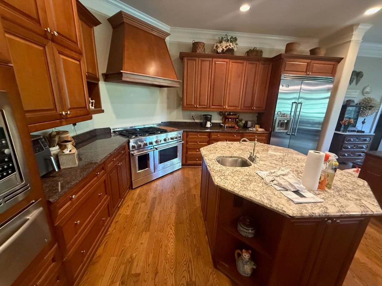 Custom Kitchen Remodel Featuring Rich Wooden Cabinetry and Granite Countertops image